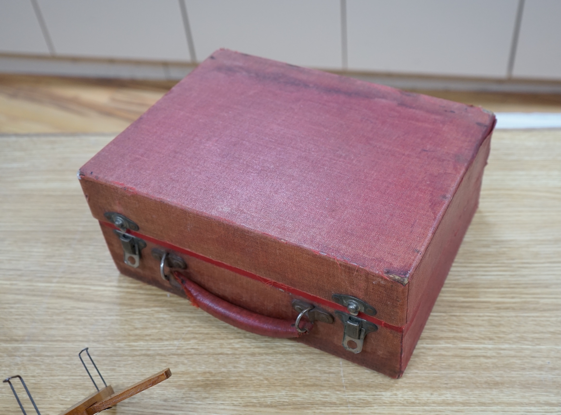 An R.K. White Co. stereoscopic viewer and a collection of slides, viewer 33cm long. Condition - cards have been damp at some point